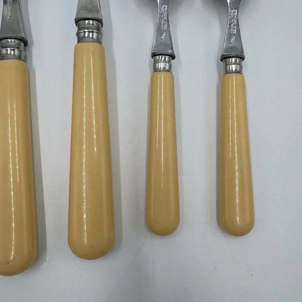 Jean Dubost Yellow Flatware 8 Pc Lot Stainless France Knives Spoons